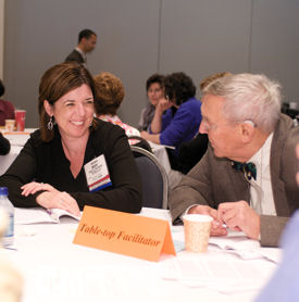 Table-top facilitator Mary Busowski ACP Member guides program participants through examples of leadership in medicine Photo by Kevin Berne