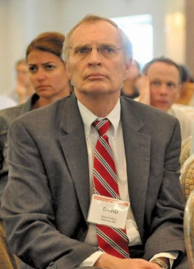 An attendee of the annual Society for General Internal Medicine meeting listens in on a scientific session
