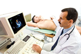 Doctor performing an ultrasound heart scan on a patient