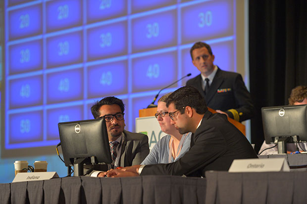 Faheem Beg, MBBS, Cassidy Overpeck, MD, and Antoine Saliba, MD, all ACP Resident/Fellow Members from the Indiana chapter, compete in Doctor's Dilemma® The finals were moderated by Lt Cmdr Brent Wal