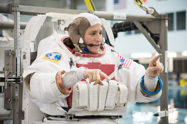 NASA astronaut Serena M Aunon-Chancellor MD FACP attired in a training version of her Extravehicular Mobility Unit spacesuit is pictured prior to the start of a spacewalk training s